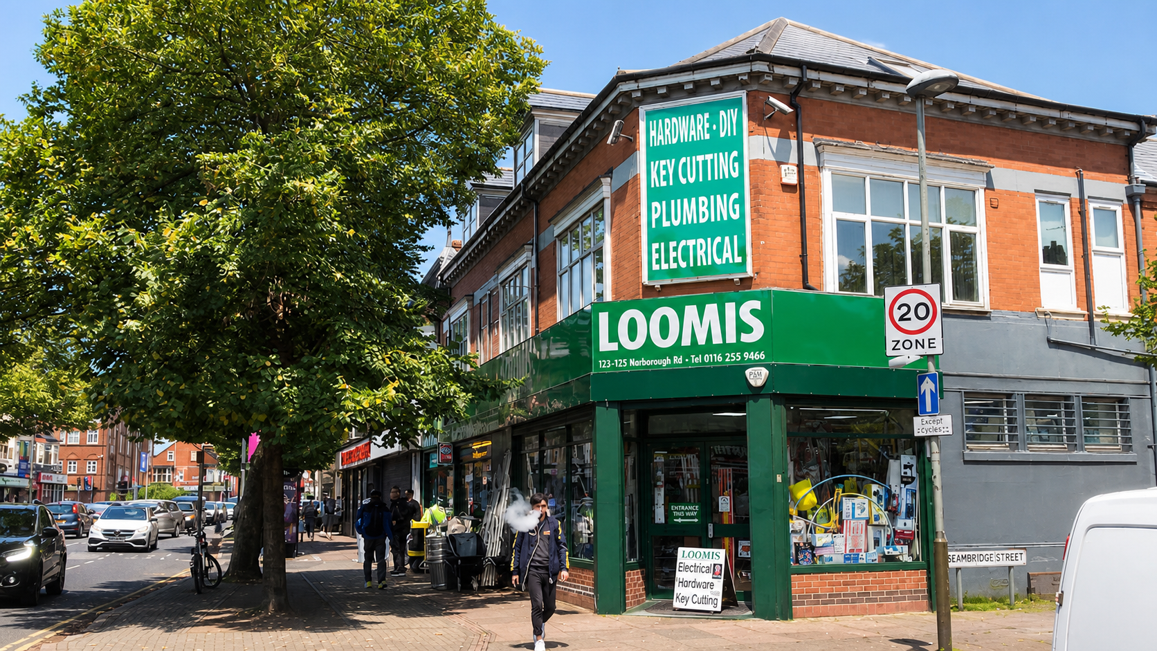 Sunny exterior view of the Loomis Hardware shopfront on Narborough Road, Leicester